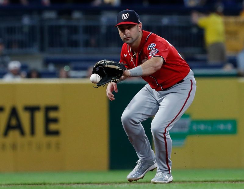 Sep 13, 2023; Pittsburgh, Pennsylvania, USA; Washington Nationals third baseman Jake Alu (39) fields a ground ball for an out against Pittsburgh Pirates third baseman Jared Triolo (not pictured) during the fourth inning at PNC Park. Mandatory Credit: Charles LeClaire-USA TODAY Sports