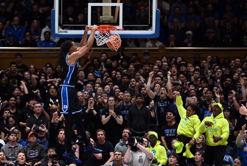 Dec 2, 2025; Durham, North Carolina, USA; Duke Blue Devils forward Maliq Brown (6) dunks during the first half against the Florida Gators at Cameron Indoor Stadium. Mandatory Credit: Rob Kinnan-Imagn Images