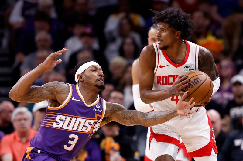 PHOENIX, ARIZONA - MARCH 02: Bradley Beal #3 of the Phoenix Suns pressures Jalen Green #4 of the Houston Rockets during the first half at Footprint Center on March 02, 2024 in Phoenix, Arizona. NOTE TO USER: User expressly acknowledges and agrees that, by downloading and or using this photograph, User is consenting to the terms and conditions of the Getty Images License Agreement.  (Photo by Chris Coduto/Getty Images)