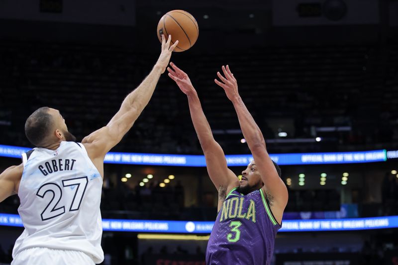 NEW ORLEANS, LOUISIANA - JANUARY 07: Rudy Gobert #27 of the Minnesota Timberwolves blocks a shot from CJ McCollum #3 of the New Orleans Pelicans during the first half at the Smoothie King Center on January 07, 2025 in New Orleans, Louisiana. NOTE TO USER: User expressly acknowledges and agrees that, by downloading and or using this Photograph, user is consenting to the terms and conditions of the Getty Images License Agreement. (Photo by Jonathan Bachman/Getty Images)