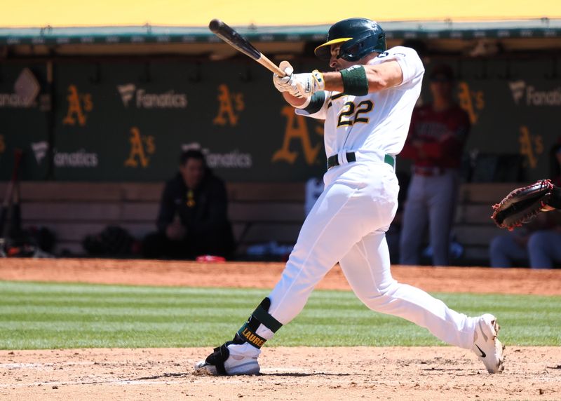 May 17, 2023; Oakland, California, USA; Oakland Athletics right fielder Ramon Laureano (22) hits a three-run home run against the Arizona Diamondbacks during the seventh inning at Oakland-Alameda County Coliseum. Mandatory Credit: Kelley L Cox-USA TODAY Sports