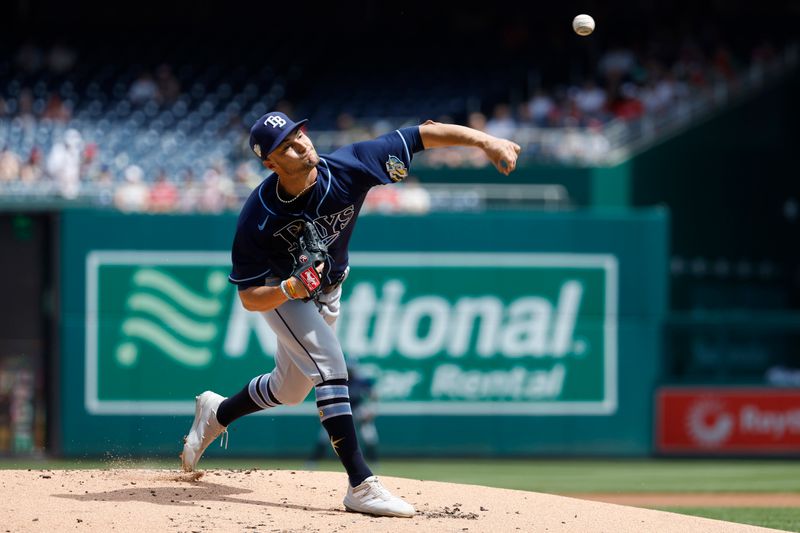 Apr 5, 2023; Washington, District of Columbia, USA; Tampa Bay Rays starting pitcher Shane McClanahan (18) pitches against the Washington Nationals during the first inning at Nationals Park. Mandatory Credit: Geoff Burke-USA TODAY Sports