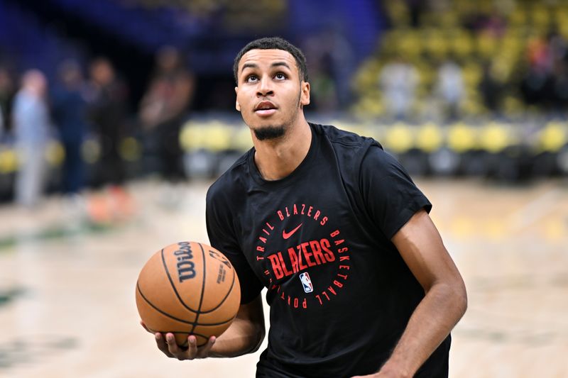 SEATTLE, WASHINGTON - OCTOBER 11: Kris Murray #24 of the Portland Trail Blazers warms up before the Rain City Showcase game against the LA Clippers at Climate Pledge Arena on October 11, 2024 in Seattle, Washington. NOTE TO USER: User expressly acknowledges and agrees that, by downloading and or using this photograph, User is consenting to the terms and conditions of the Getty Images License Agreement. (Photo by Alika Jenner/Getty Images)