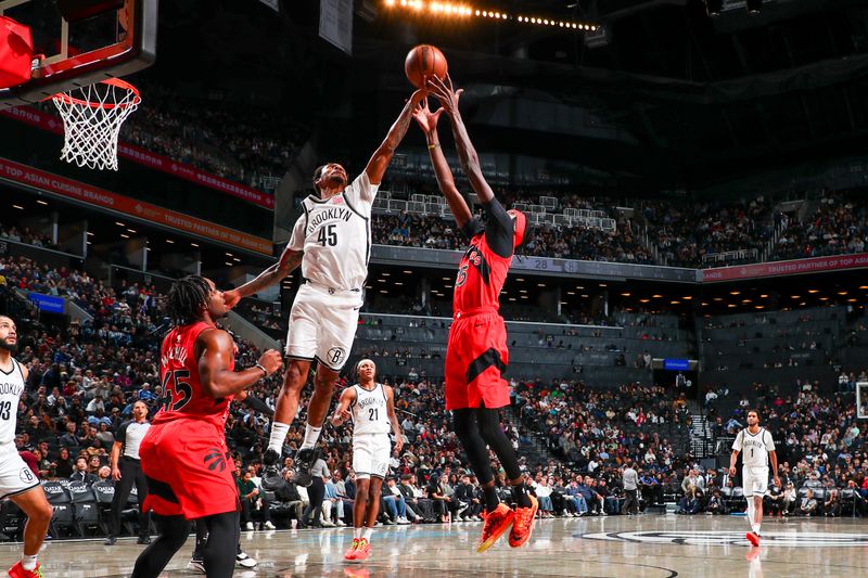 BROOKLYN, NY - OCTOBER 18: Keon Johnson #45 of the Brooklyn Nets rebounds the ball during the game on October 18, 2024 at Barclays Center in Brooklyn, New York. NOTE TO USER: User expressly acknowledges and agrees that, by downloading and or using this Photograph, user is consenting to the terms and conditions of the Getty Images License Agreement. Mandatory Copyright Notice: Copyright 2024 NBAE (Photo by David L. Nemec/NBAE via Getty Images)