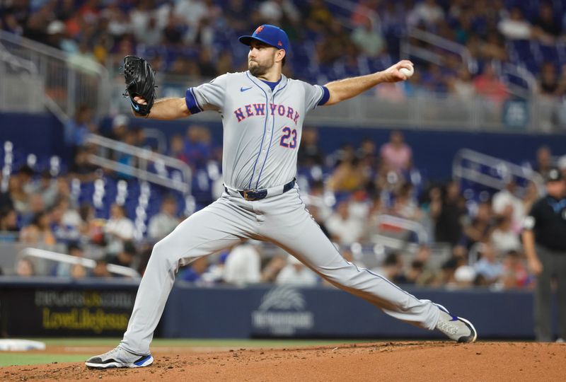 Jul 22, 2024; Miami, Florida, USA;  New York Mets starting pitcher David Peterson (23) pitches against the Miami Marlins in the second inning at loanDepot Park. Mandatory Credit: Rhona Wise-USA TODAY Sports