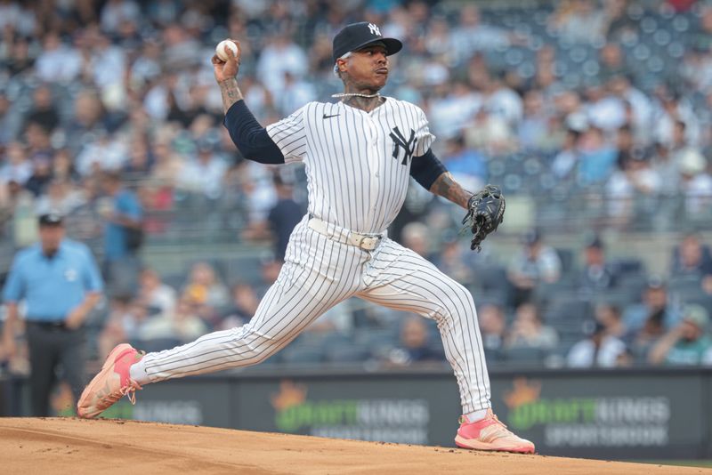 Jun 6, 2024; Bronx, New York, USA;New York Yankees starting pitcher Marcus Stroman (0) delivers a pitch during the first inning against the Minnesota Twins at Yankee Stadium. Mandatory Credit: Vincent Carchietta-USA TODAY Sports