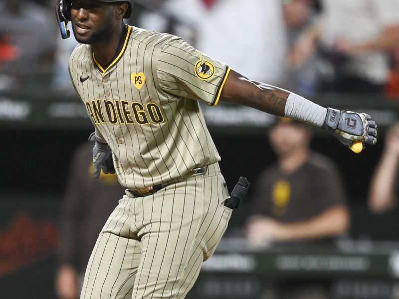 Jul 26, 2024; Baltimore, Maryland, USA; San Diego Padres outfielder Jurickson Profar (10) celebrates his two run ninth inning home run against the Baltimore Orioles  at Oriole Park at Camden Yards. Mandatory Credit: Tommy Gilligan-USA TODAY Sports