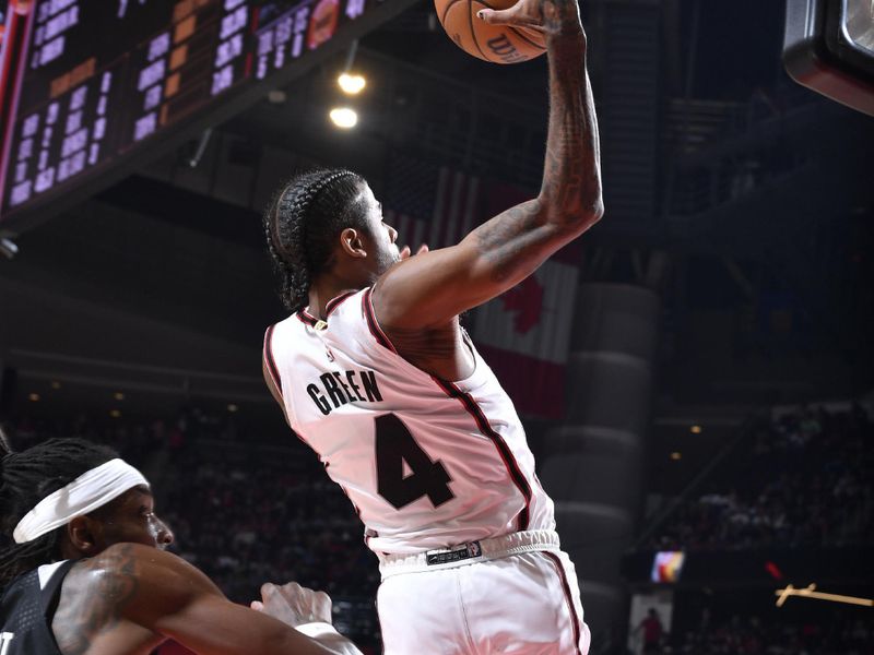 HOUSTON, TX -NOVEMBER 23: Jalen Green #4 of the Houston Rockets drives to the basket during the game against the Portland Trail Blazers on November 23, 2024 at the Toyota Center in Houston, Texas. NOTE TO USER: User expressly acknowledges and agrees that, by downloading and or using this photograph, User is consenting to the terms and conditions of the Getty Images License Agreement. Mandatory Copyright Notice: Copyright 2024 NBAE (Photo by Logan Riely/NBAE via Getty Images)