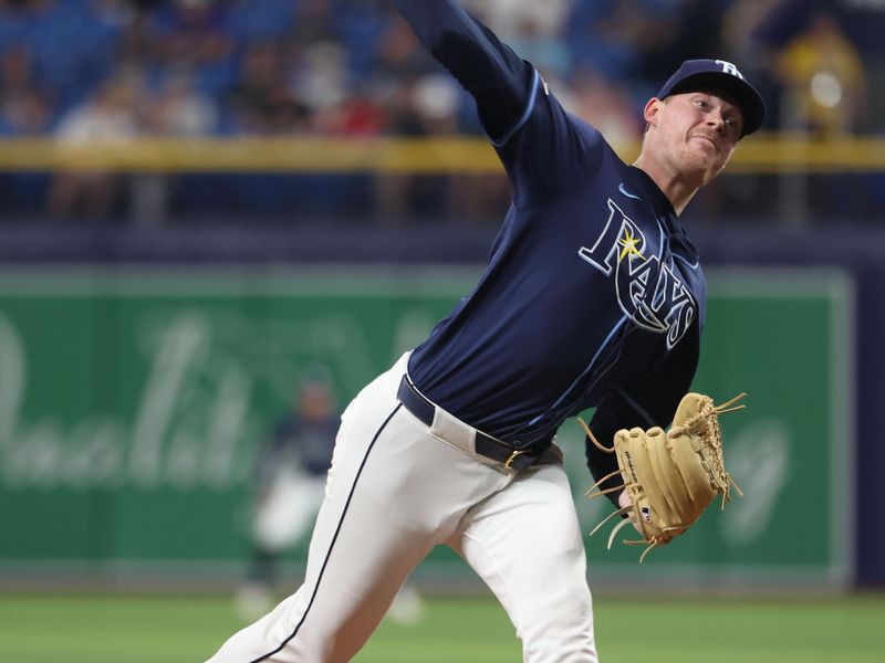 Jun 24, 2024; St. Petersburg, Florida, USA;  Tampa Bay Rays pitcher Pete Fairbanks (29) throws a pitch against the Seattle Mariners during the ninth inning at Tropicana Field. Mandatory Credit: Kim Klement Neitzel-USA TODAY Sports