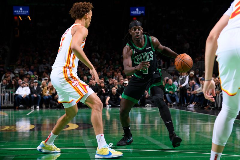 BOSTON, MA - NOVEMBER 12: Jrue Holiday #4 of the Boston Celtics drives to the basket during the game against the Atlanta Hawks during the Emirates NBA Cup game on November 12, 2024 at TD Garden in Boston, Massachusetts. NOTE TO USER: User expressly acknowledges and agrees that, by downloading and/or using this Photograph, user is consenting to the terms and conditions of the Getty Images License Agreement. Mandatory Copyright Notice: Copyright 2024 NBAE (Photo by Brian Babineau/NBAE via Getty Images)