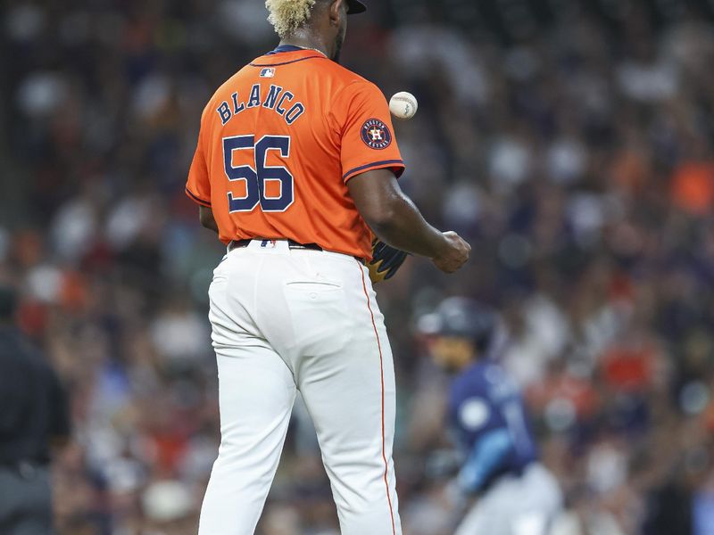 May 3, 2024; Houston, Texas, USA; Houston Astros starting pitcher Ronel Blanco (56) reacts as Seattle Mariners second baseman Jorge Polanco (7) rounds the bases after hitting a home run during the third inning at Minute Maid Park. Mandatory Credit: Troy Taormina-USA TODAY Sports