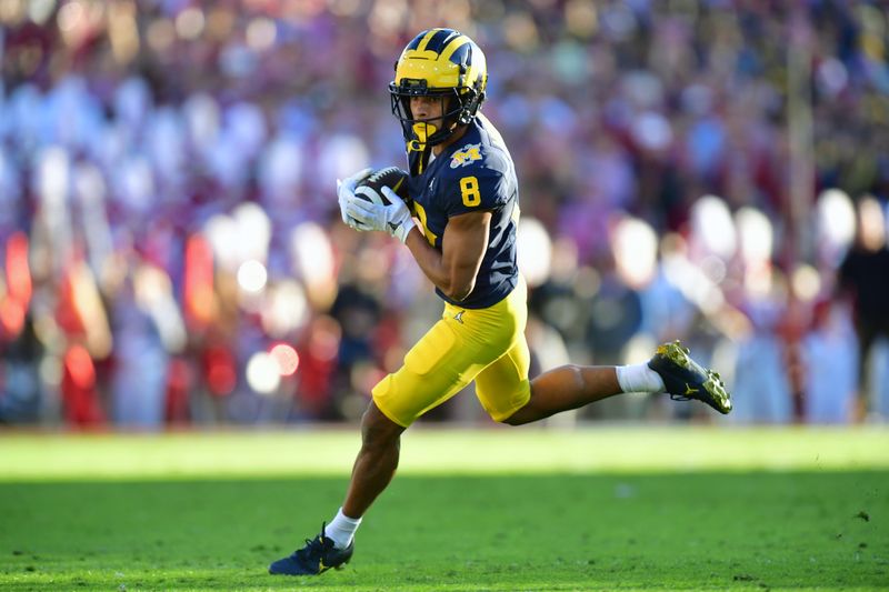 Jan 1, 2024; Pasadena, CA, USA; Michigan Wolverines wide receiver Tyler Morris (8) runs for a touchdown in the second quarter against the Alabama Crimson Tide in the 2024 Rose Bowl college football playoff semifinal game at Rose Bowl. Mandatory Credit: Gary A. Vasquez-USA TODAY Sports