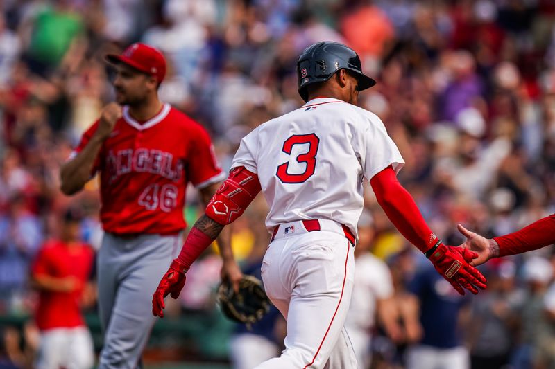 Jun 4, 2025; Boston, Massachusetts, USA; Boston Red Sox outfielder Ceddanne Rafaela (3) hits a game winning home run against Los Angeles Angels pitcher Brock Burke (46) in the ninth inning at Fenway Park. Mandatory Credit: David Butler II-Imagn Images