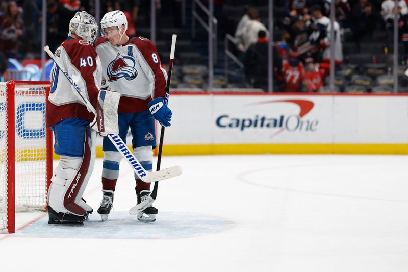 Feb 13, 2024; Washington, District of Columbia, USA; Colorado Avalanche goaltender Alexandar Georgiev (40) celebrates wth Avalanche defenseman Cale Makar (8) after their game against the Washington Capitals at Capital One Arena. Mandatory Credit: Geoff Burke-USA TODAY Sports