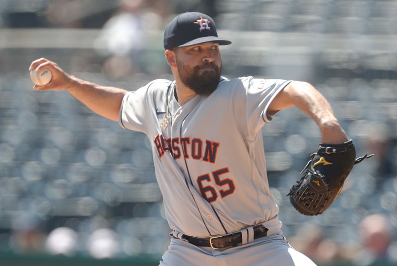 Apr 12, 2023; Pittsburgh, Pennsylvania, USA;  Houston Astros starting pitcher Jose Urquidy (65) delivers a pitch against the Pittsburgh Pirates during the first inning at PNC Park. Mandatory Credit: Charles LeClaire-USA TODAY Sports