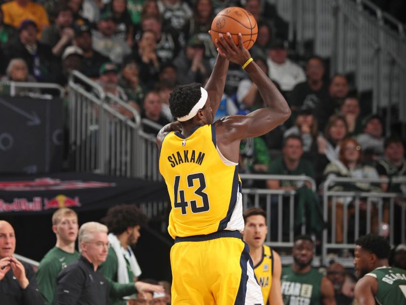 MILWAUKEE, WI - APRIL 21: Pascal Siakam #43 of the Indiana Pacers shoots the ball during the game against the Milwaukee Bucks during Round 1 Game 1 of the 2024 NBA Playoffs on April 21, 2024 at the Fiserv Forum Center in Milwaukee, Wisconsin. NOTE TO USER: User expressly acknowledges and agrees that, by downloading and or using this Photograph, user is consenting to the terms and conditions of the Getty Images License Agreement. Mandatory Copyright Notice: Copyright 2024 NBAE (Photo by Gary Dineen/NBAE via Getty Images).