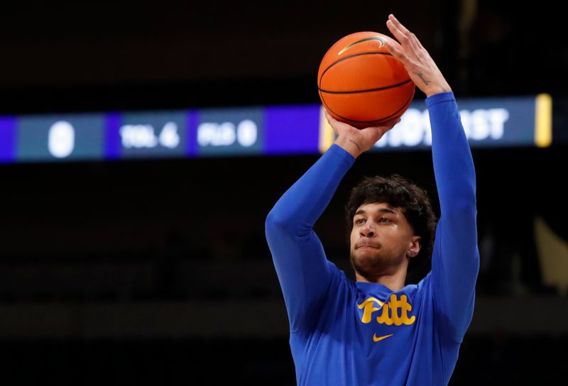 Jan 25, 2023; Pittsburgh, Pennsylvania, USA;  Pittsburgh Panthers forward Nate Santos (5) shoots on the court  before the game against the Wake Forest Demon Deacons  at the Petersen Events Center. Mandatory Credit: Charles LeClaire-USA TODAY Sports