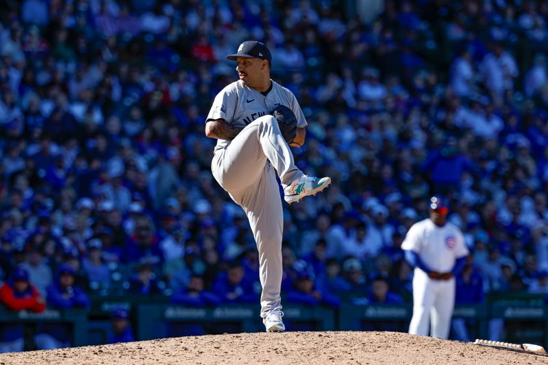 Sep 7, 2024; Chicago, Illinois, USA; New York Yankees relief pitcher Nestor Cortes (65) delivers a pitch against the Chicago Cubs during the eight inning at Wrigley Field. Mandatory Credit: Kamil Krzaczynski-Imagn Images