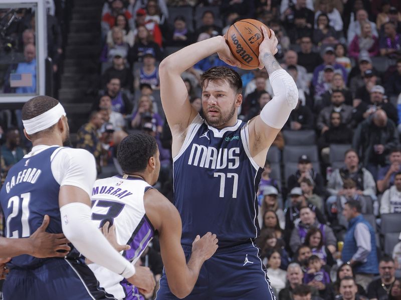 SACRAMENTO, CA - MARCH 29:  Luka Doncic #77 of the Dallas Mavericks handles the ball during the game  on March 29, 2024 at Golden 1 Center in Sacramento, California. NOTE TO USER: User expressly acknowledges and agrees that, by downloading and or using this Photograph, user is consenting to the terms and conditions of the Getty Images License Agreement. Mandatory Copyright Notice: Copyright 2024 NBAE (Photo by Rocky Widner/NBAE via Getty Images)