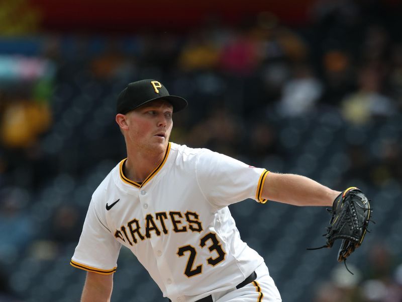 May 24, 2025; Pittsburgh, Pennsylvania, USA;  Pittsburgh Pirates starting pitcher Mitch Keller (23) delivers a pitch against the Milwaukee Brewers during the first inning at PNC Park. Mandatory Credit: Charles LeClaire-Imagn Images