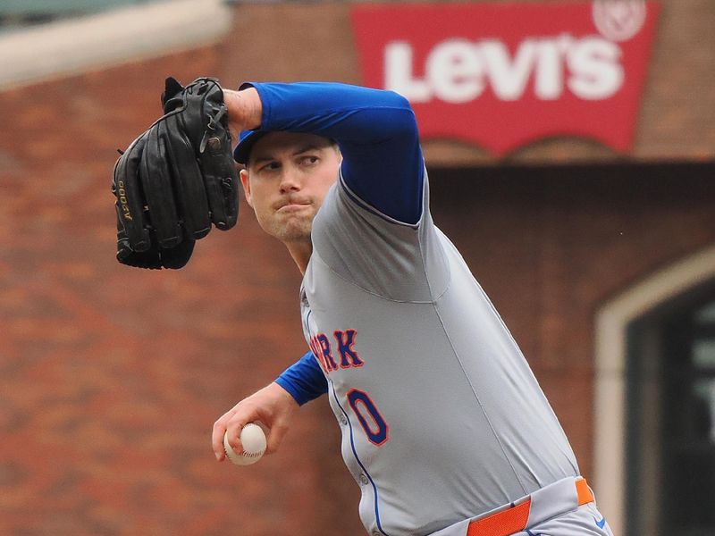 Apr 24, 2024; San Francisco, California, USA; New York Mets relief pitcher Adam Ottavino (0) pitches the ball against the San Francisco Giants during the eighth inning at Oracle Park. Mandatory Credit: Kelley L Cox-USA TODAY Sports