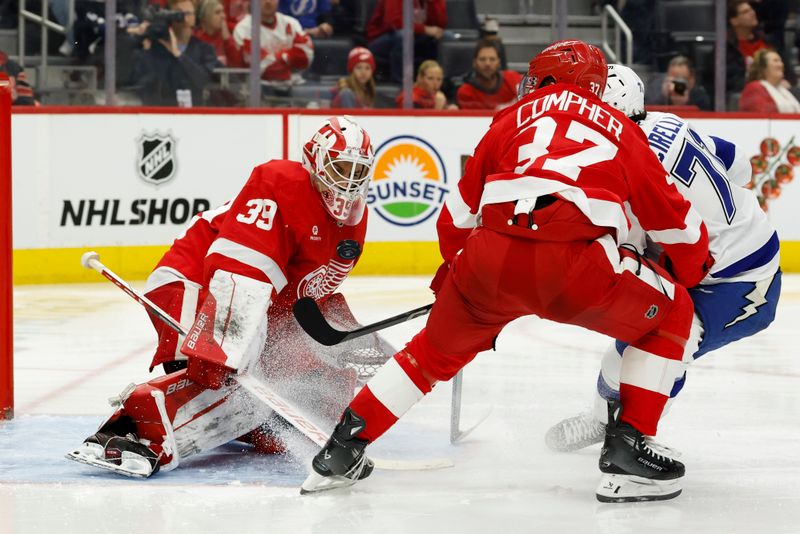 Jan 25, 2025; Detroit, Michigan, USA;  Detroit Red Wings goaltender Cam Talbot (39) makes a save in the third period against the Tampa Bay Lightning at Little Caesars Arena. Mandatory Credit: Rick Osentoski-Imagn Images