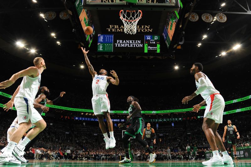 BOSTON, MA - JANUARY 27: Kawhi Leonard #2 of the LA Clippers rebounds the ball during the game against the Boston Celtics on January 27, 2024 at the TD Garden in Boston, Massachusetts. NOTE TO USER: User expressly acknowledges and agrees that, by downloading and or using this photograph, User is consenting to the terms and conditions of the Getty Images License Agreement. Mandatory Copyright Notice: Copyright 2024 NBAE  (Photo by Brian Babineau/NBAE via Getty Images)