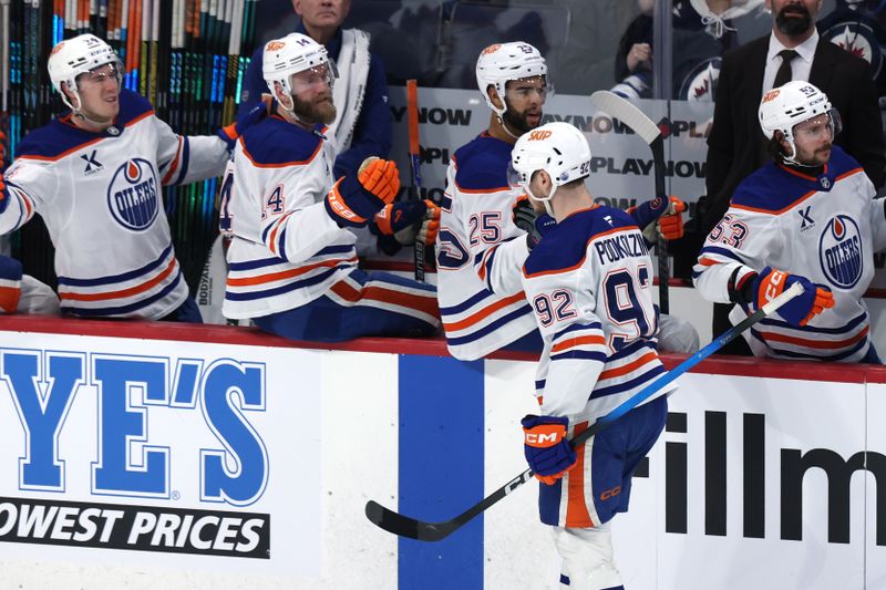 Jan 8, 2026; Winnipeg, Manitoba, CAN; Edmonton Oilers right wing Vasily Podkolzin (92) celebrates a goal against the Winnipeg Jets in the first period at Canada Life Centre. Mandatory Credit: James Carey Lauder-Imagn Images