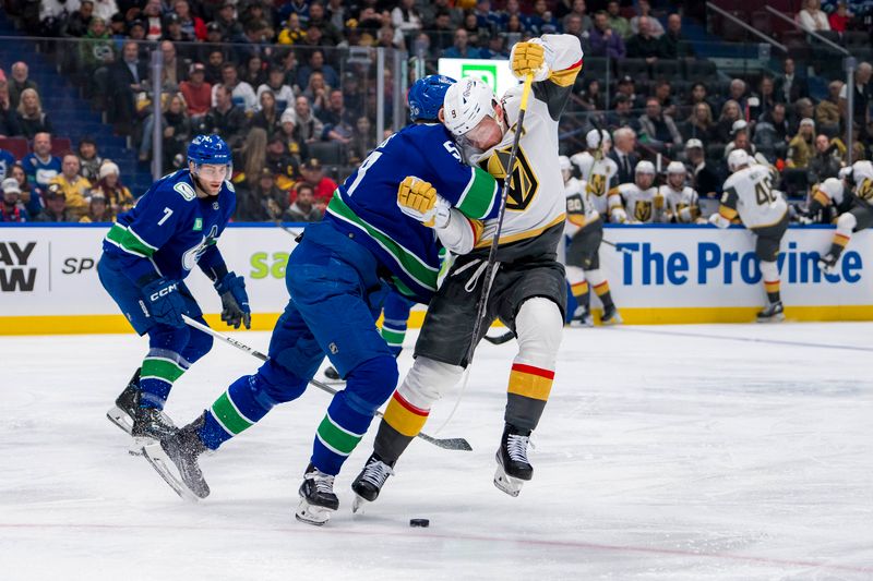 Apr 8, 2024; Vancouver, British Columbia, CAN; Vancouver Canucks defenseman Tyler Myers (57) checks Vegas Golden Knights forward Jack Eichel (9) in the second period  at Rogers Arena. Mandatory Credit: Bob Frid-USA TODAY Sports