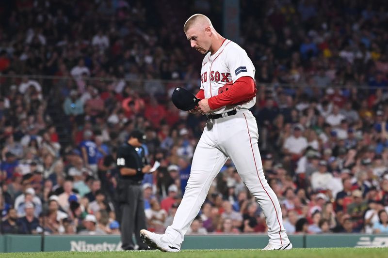 Aug 13, 2024; Boston, Massachusetts, USA; Boston Red Sox pitcher Cam Booser (71) is relived during the sixth inning against the Texas Rangers at Fenway Park. Mandatory Credit: Eric Canha-USA TODAY Sports