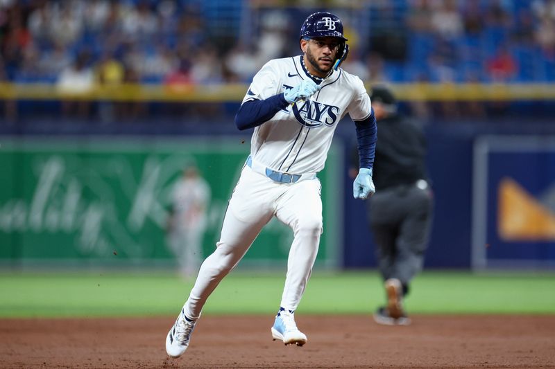 Sep 19, 2024; St. Petersburg, Florida, USA; Tampa Bay Rays outfielder Jose Siri (22) runs the bases against the Boston Red Sox in the third inning at Tropicana Field. Mandatory Credit: Nathan Ray Seebeck-Imagn Images