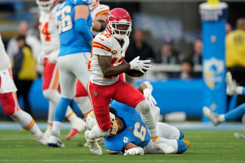 Kansas City Chiefs wide receiver Mecole Hardman Jr. (12) runs the ball during an NFL football game against the Los Angeles Chargers Monday, Jan. 8, 2024, in Inglewood, Calif. (AP Photo/Ashley Landis)