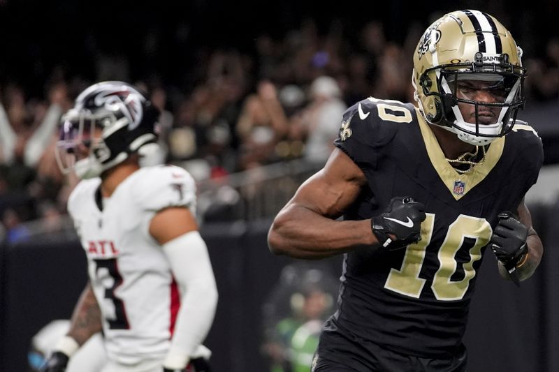 New Orleans Saints wide receiver Marquez Valdes-Scantling (10) celebrates his touchdown against the Atlanta Falcons during the first half of an NFL football game, Sunday, Nov. 10, 2024, in New Orleans. (AP Photo/Gerald Herbert)