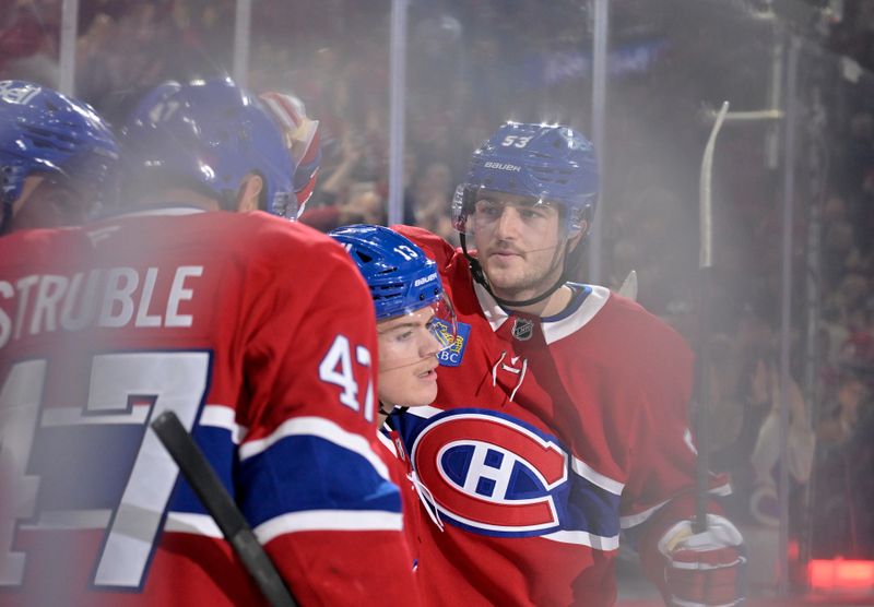 Nov 15, 2025; Montreal, Quebec, CAN; Montreal Canadiens forward Cole Caufield (13) celebrates with teammates after scoring a goal against the Boston Bruins  during the second period at the Bell Centre. Mandatory Credit: Eric Bolte-Imagn Images