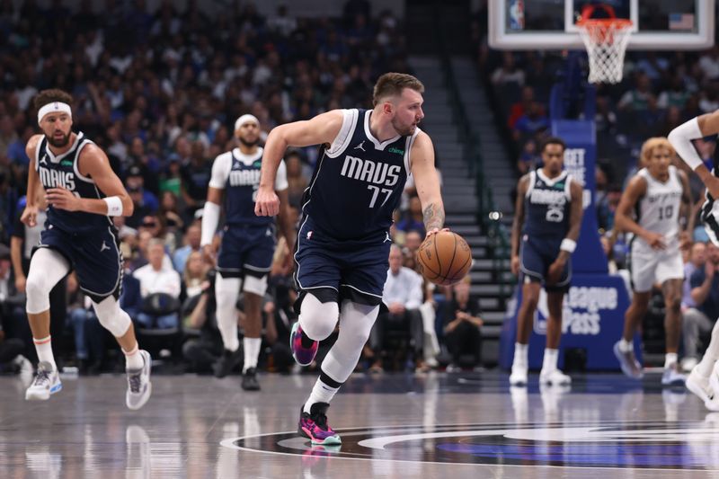 DALLAS, TX - OCTOBER 24: Luka Doncic #77 of the Dallas Mavericks dribbles the ball during the game against the San Antonio Spurs on October 24, 2024 at American Airlines Center in Dallas, Texas. NOTE TO USER: User expressly acknowledges and agrees that, by downloading and or using this photograph, User is consenting to the terms and conditions of the Getty Images License Agreement. Mandatory Copyright Notice: Copyright 2024 NBAE (Photo by Joe Murphy/NBAE via Getty Images)