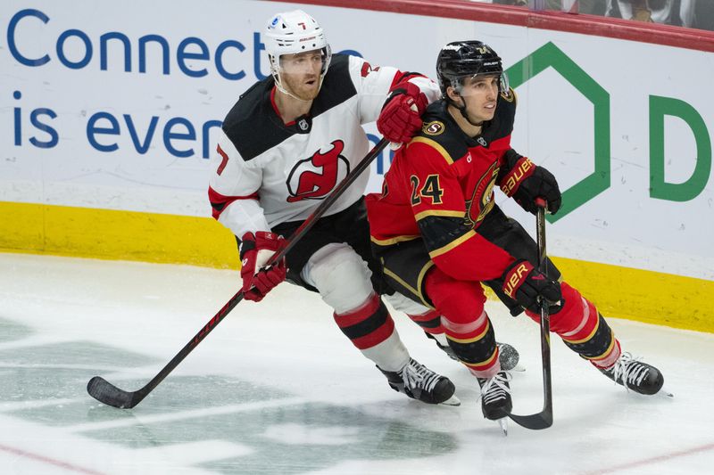 Dec 9, 2025; Ottawa, Ontario, CAN; New Jersey Devils defenseman Dougie Hamilton (7) and Ottawa Senators center Dylan Cozens (24) follow the puck in the third period at the Canadian Tire Centre. Mandatory Credit: Marc DesRosiers-IMAGN Images