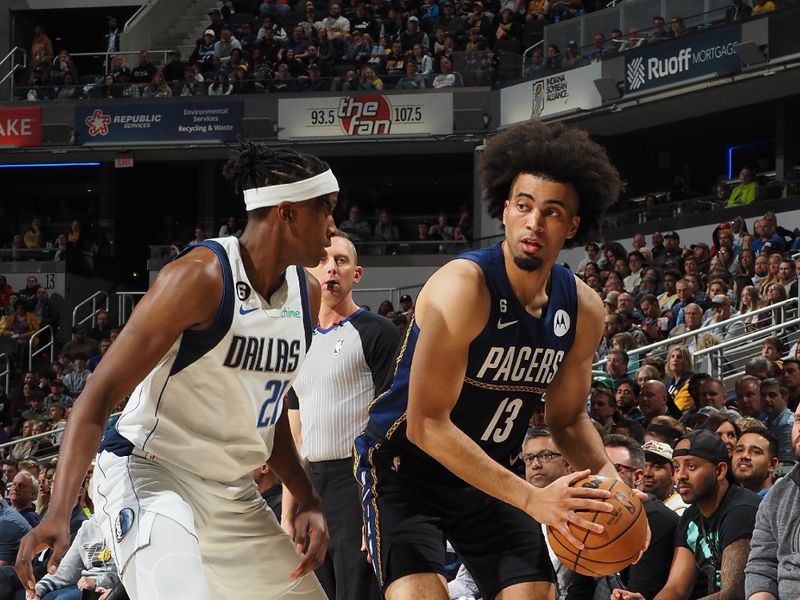 INDIANAPOLIS, IN - MARCH 27: Jordan Nwora #13 of the Indiana Pacers handles the ball during the game against the Dallas Mavericks on March 27, 2023 at Gainbridge Fieldhouse in Indianapolis, Indiana. NOTE TO USER: User expressly acknowledges and agrees that, by downloading and or using this Photograph, user is consenting to the terms and conditions of the Getty Images License Agreement. Mandatory Copyright Notice: Copyright 2023 NBAE (Photo by Ron Hoskins/NBAE via Getty Images)