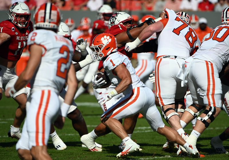 Oct 28, 2023; Raleigh, North Carolina, USA; Clemson Tigers running back Will Shipley (1) runs the ball during the first half against the North Carolina State Wolfpack at Carter-Finley Stadium. Mandatory Credit: Rob Kinnan-USA TODAY Sports