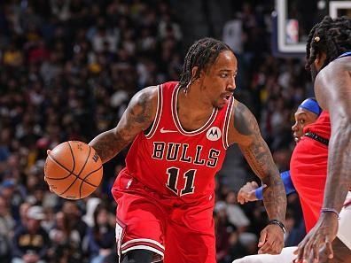 DENVER, CO - NOVEMBER 4: DeMar DeRozan #11 of the Chicago Bulls dribbles the ball during the game against the Denver Nuggets on November 4, 2023 at the Ball Arena in Denver, Colorado. NOTE TO USER: User expressly acknowledges and agrees that, by downloading and/or using this Photograph, user is consenting to the terms and conditions of the Getty Images License Agreement. Mandatory Copyright Notice: Copyright 2023 NBAE (Photo by Bart Young/NBAE via Getty Images)