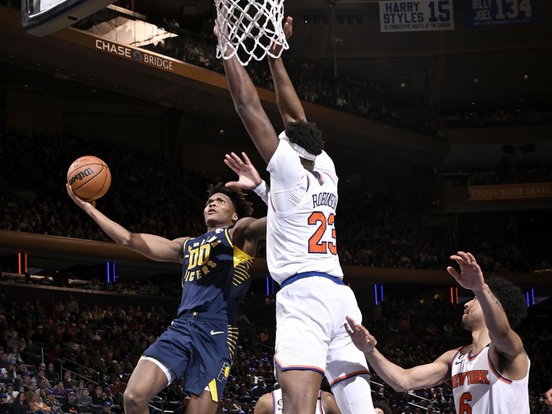 NEW YORK, NY - APRIL 9: Bennedict Mathurin #00 of the Indiana Pacers drives to the basket during the game against the New York Knicks on April 9, 2023 at Madison Square Garden in New York City, New York. NOTE TO USER: User expressly acknowledges and agrees that, by downloading and or using this photograph, User is consenting to the terms and conditions of the Getty Images License Agreement. Mandatory Copyright Notice: Copyright 2023 NBAE  (Photo by David Dow/NBAE via Getty Images)