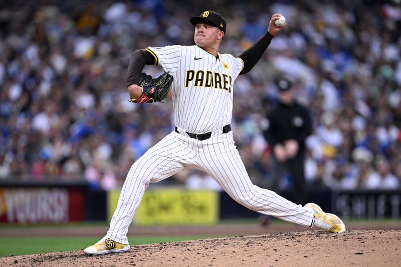 May 11, 2024; San Diego, California, USA; San Diego Padres relief pitcher Adrian Morejon (50) throws a pitch against the Los Angeles Dodgers during the sixth inning at Petco Park. Mandatory Credit: Orlando Ramirez-USA TODAY Sports