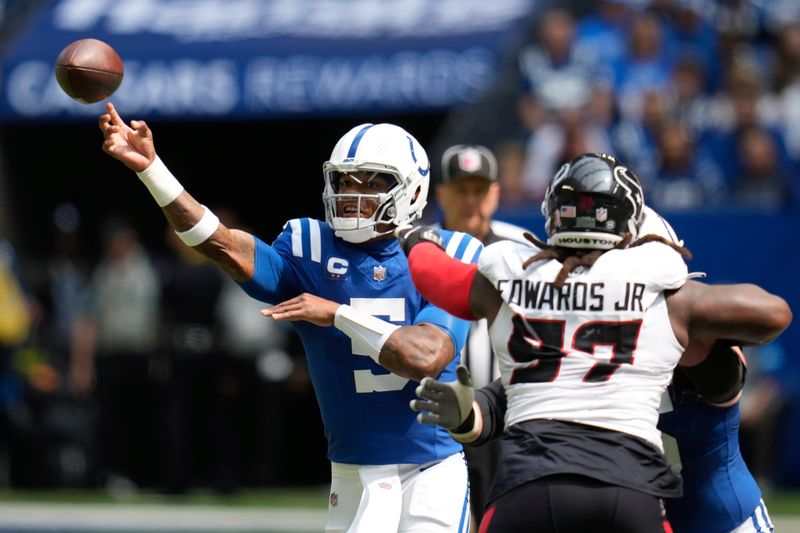 Indianapolis Colts quarterback Anthony Richardson (5) throws during the first half of an NFL football game against the Houston Texans, Sunday, Sept. 8, 2024, in Indianapolis. (AP Photo/Darron Cummings)