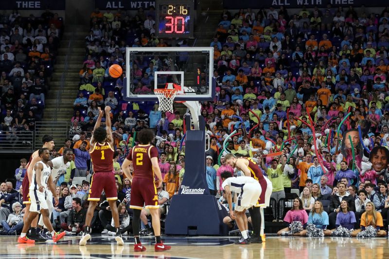 Jan 27, 2024; University Park, Pennsylvania, USA; Penn State students attempt to distract Minnesota Golden Gophers forward Joshua Ola-Joseph (1) while shooting free throws during the first half against the Minnesota Golden Gophers at Bryce Jordan Center. Minnesota defeated Penn State 83-74. Mandatory Credit: Matthew O'Haren-USA TODAY Sports