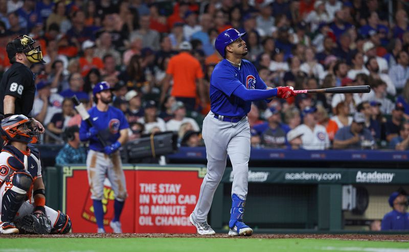 May 17, 2023; Houston, Texas, USA; Chicago Cubs center fielder Christopher Morel (5) hits a home run during the fourth inning against the Houston Astros at Minute Maid Park. Mandatory Credit: Troy Taormina-USA TODAY Sports