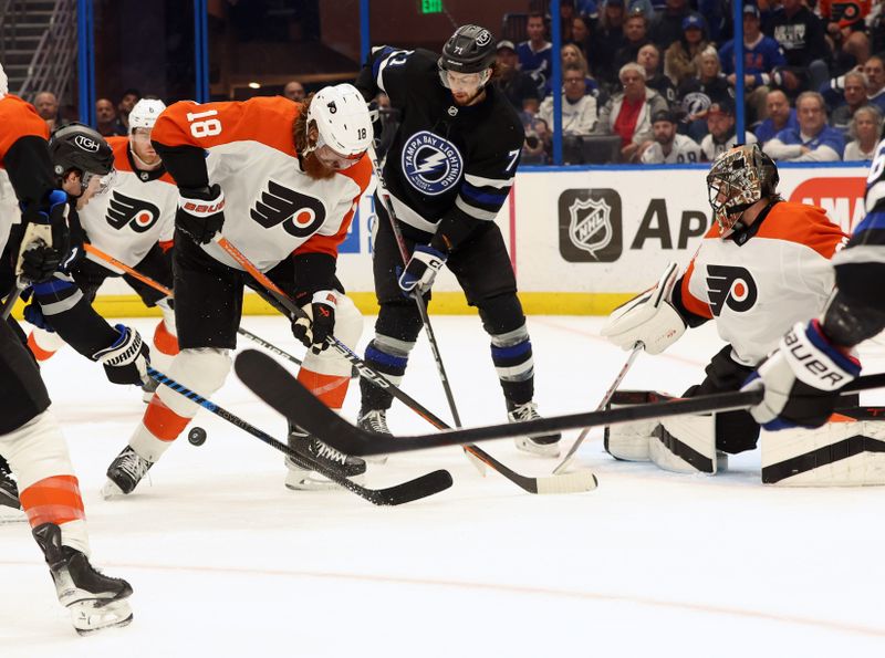 Mar 9, 2024; Tampa, Florida, USA; Philadelphia Flyers defenseman Marc Staal (18) defends the puck against Tampa Bay Lightning center Anthony Cirelli (71) during the first period at Amalie Arena. Mandatory Credit: Kim Klement Neitzel-USA TODAY Sports