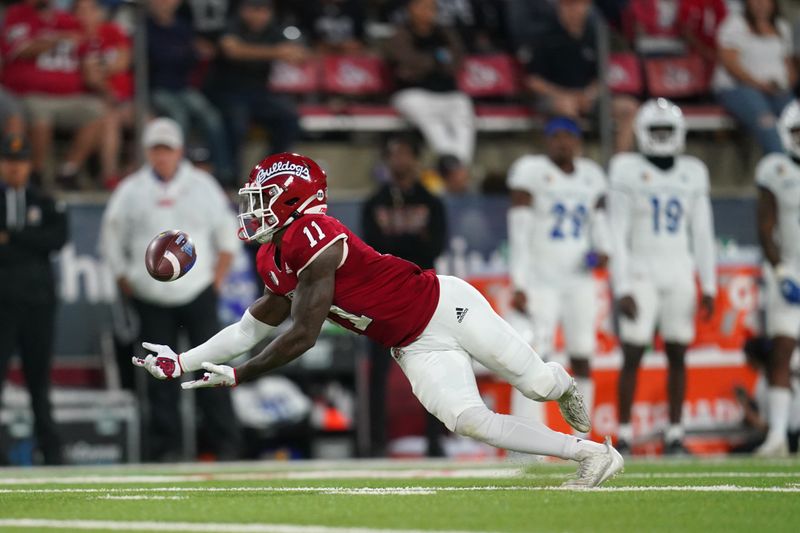 Oct 15, 2022; Fresno, California, USA; Fresno State Bulldogs defensive back Cale Sanders Jr. (11) is unable to intercept a pass against the San Jose State Spartans in the third quarter at Valley Children's Stadium. Mandatory Credit: Cary Edmondson-USA TODAY Sports