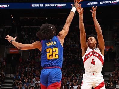 TORONTO, CANADA - DECEMBER 20: Zeke Nnaji #22 of the Denver Nuggets block during the game against the Toronto Raptors on December 20, 2023 at the Scotiabank Arena in Toronto, Ontario, Canada.  NOTE TO USER: User expressly acknowledges and agrees that, by downloading and or using this Photograph, user is consenting to the terms and conditions of the Getty Images License Agreement.  Mandatory Copyright Notice: Copyright 2023 NBAE (Photo by Vaughn Ridley/NBAE via Getty Images)