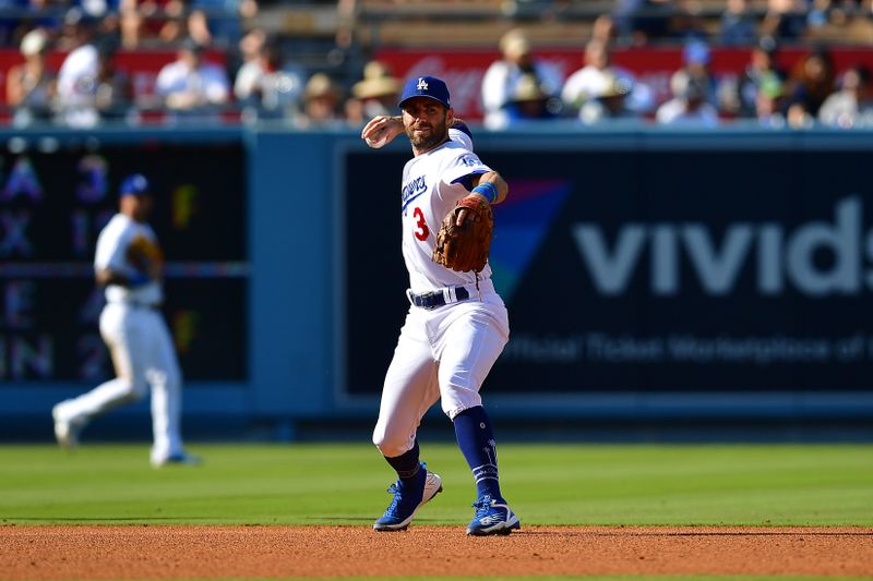 Jun 4, 2023; Los Angeles, California, USA; Los Angeles Dodgers shortstop Chris Taylor (3) throws to first for the out against New York Yankees left fielder Willie Calhoun (24) during the fourth inning at Dodger Stadium. Mandatory Credit: Gary A. Vasquez-USA TODAY Sports